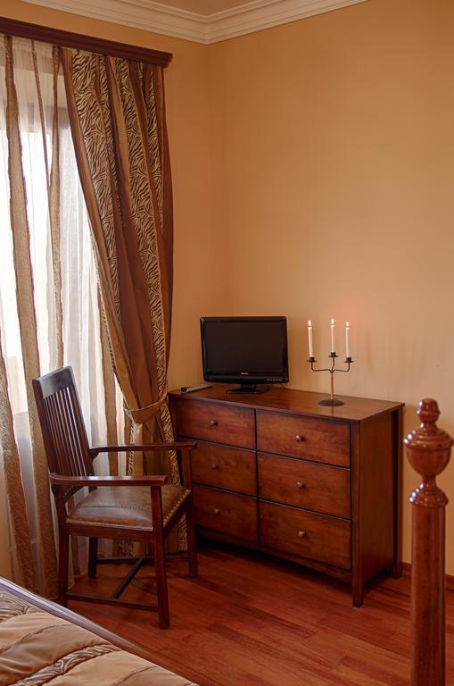 Tsaghkunq Guest House Севан Стая снимка
